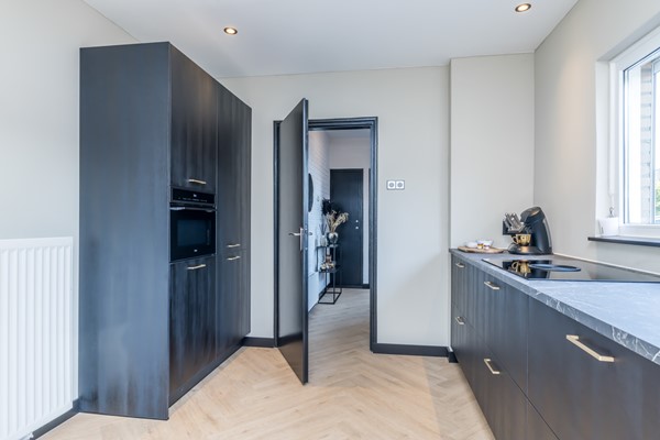 Foto - Verkocht onder voorbehoud: 2 kap geschakelde woning met garage en tuin in Brunssum